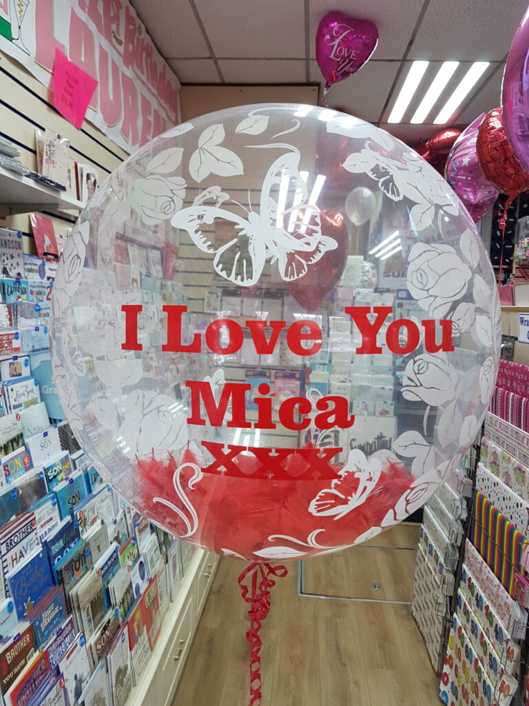 I love you bubble balloon with red feathers