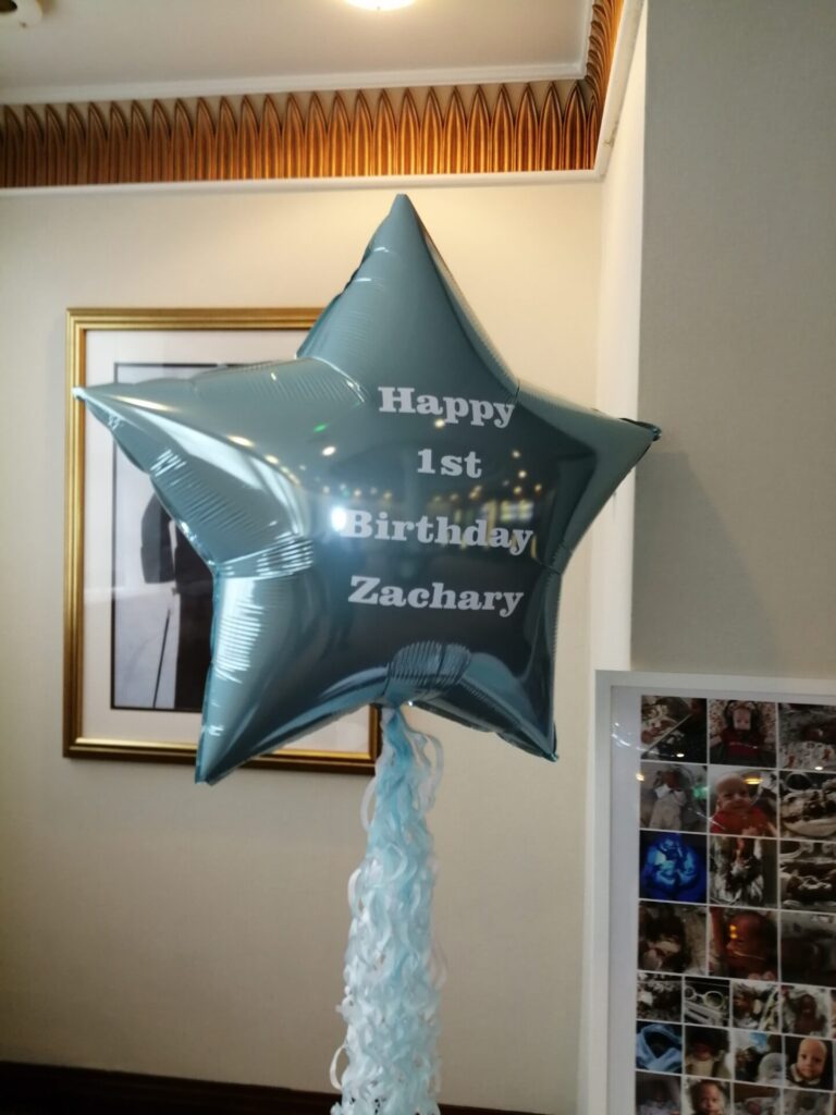Happy 1st birthday star foil balloon