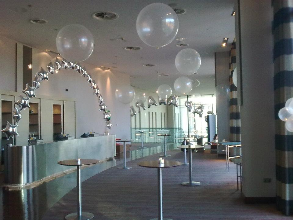 Silver star foil balloon arch and orbz balloons