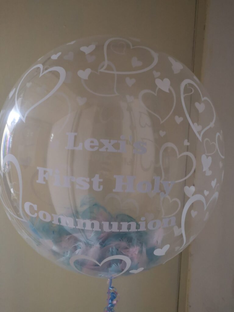 First holy communion bubble balloon with blue and white feathers