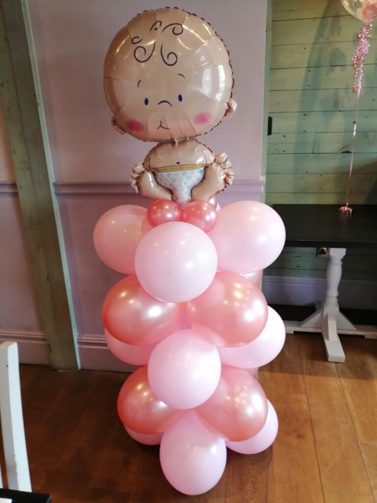 Baby foil on a pink pillar balloons
